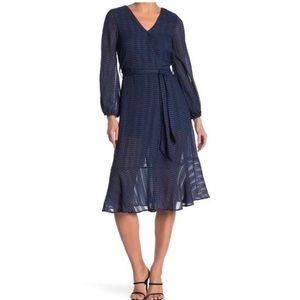 NSR Navy Blue Faux wrap dress with ruffled hem in Size Small. NWOT